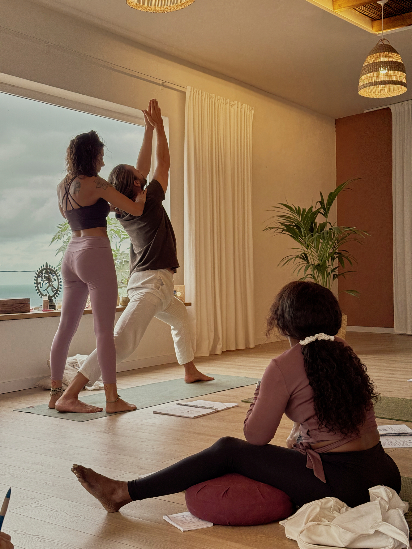 Yoga practice with assist