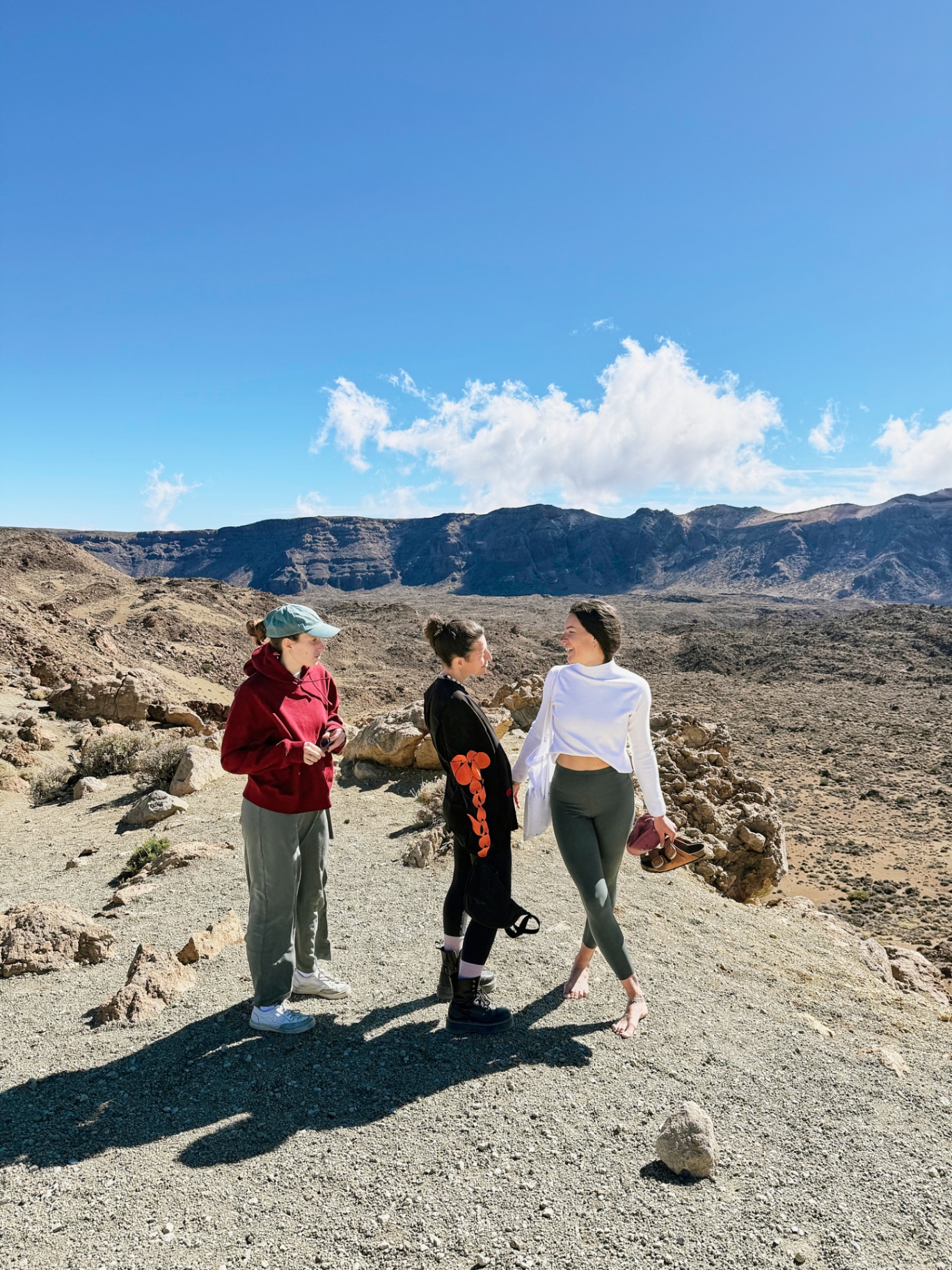 Friends exploring the volcanic landscape